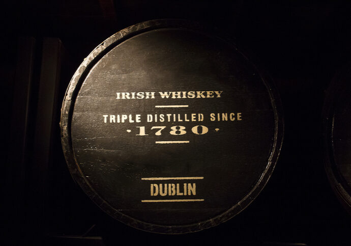 Old wooden barrel full of Dublin's Irish whiskey.